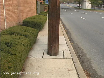 pole in sidewalk