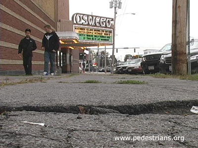 Cracked sidewalk in Oswego.