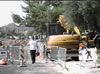 Photo - Keeping sidewalks open for pedestrians during construction in Phoenix, 
      Arizona. - CLICK FOR A LARGER PHOTO